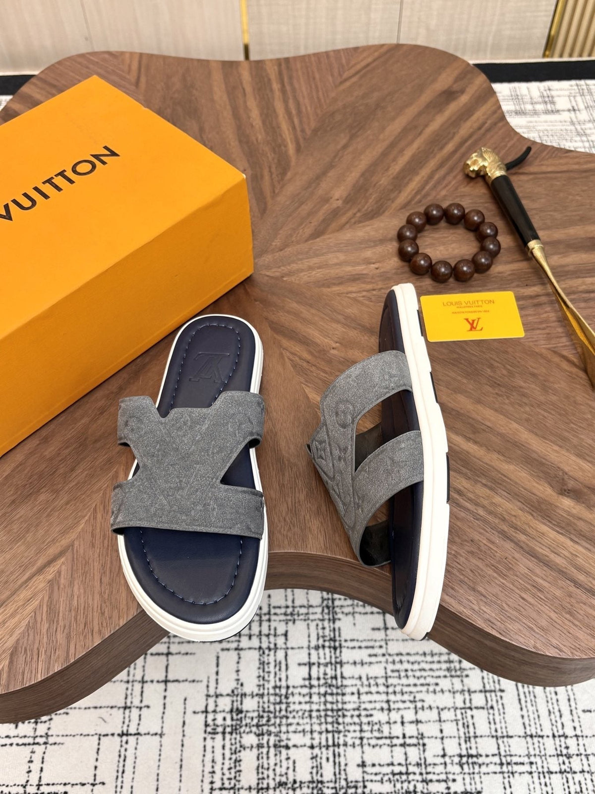 Louis Vuitton Embossed Navy Blue Slide Sandals — side