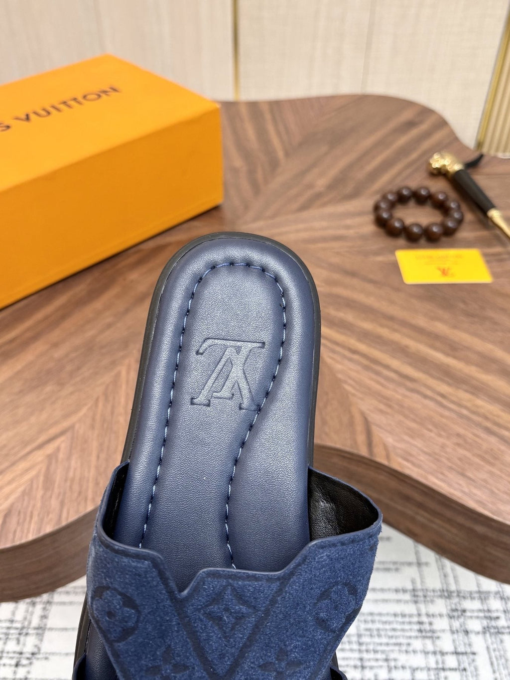Louis Vuitton Embossed Navy Blue Slide Sandals — detail