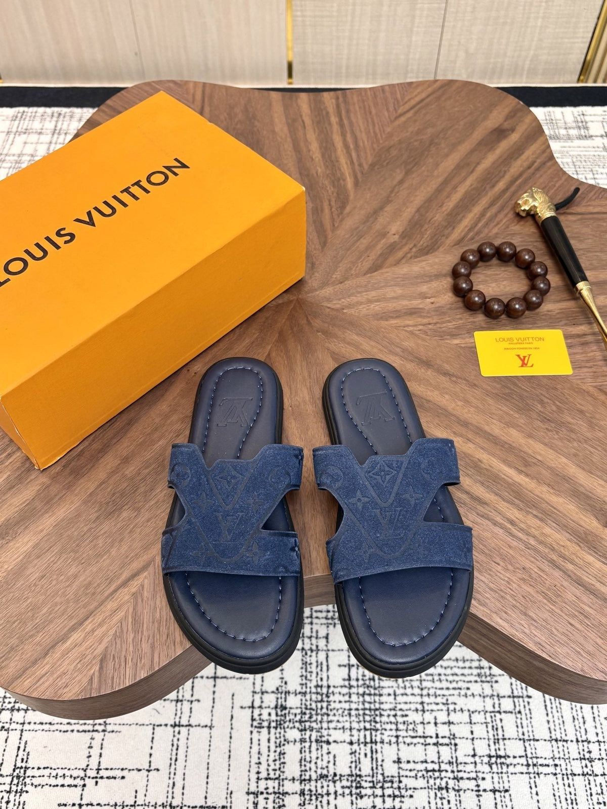 Louis Vuitton Embossed Navy Blue Slide Sandals — hero