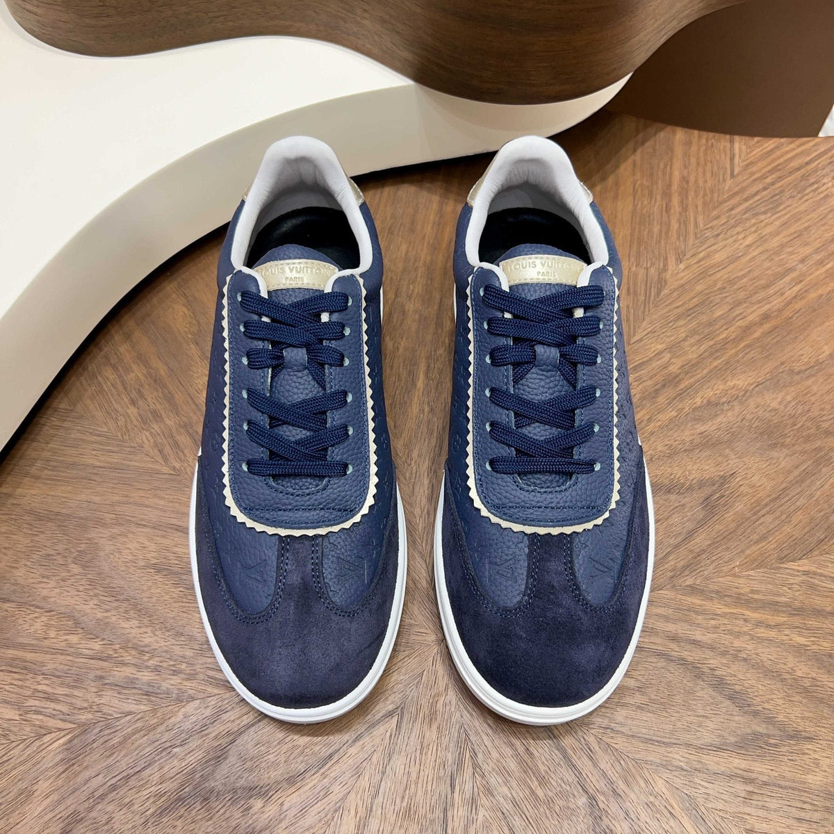 Louis Vuitton Embossed Low-Top Sneakers — front