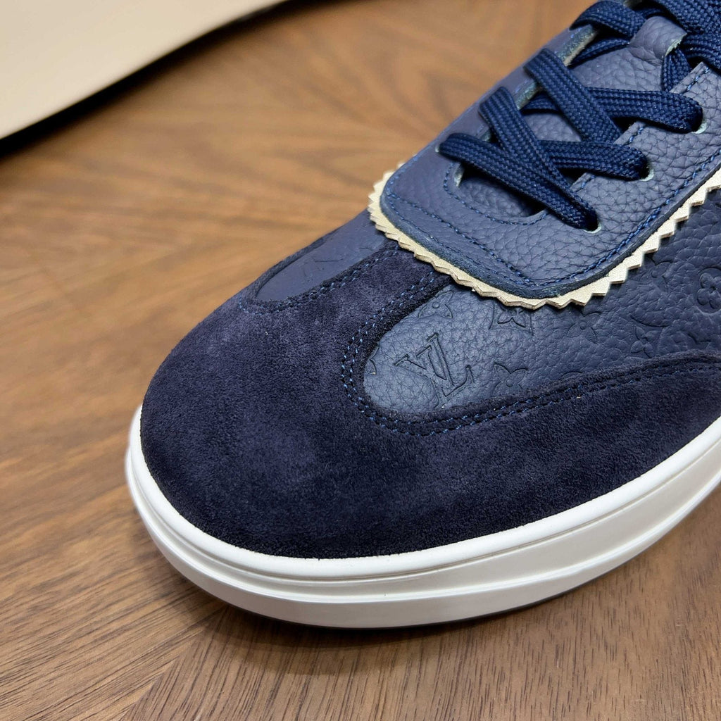 Louis Vuitton Embossed Low-Top Sneakers — detail