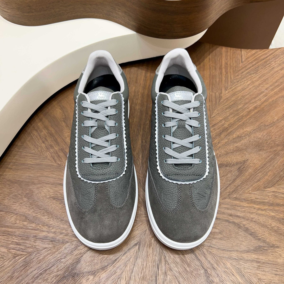 Louis Vuitton Embossed Low-Top Sneakers — front