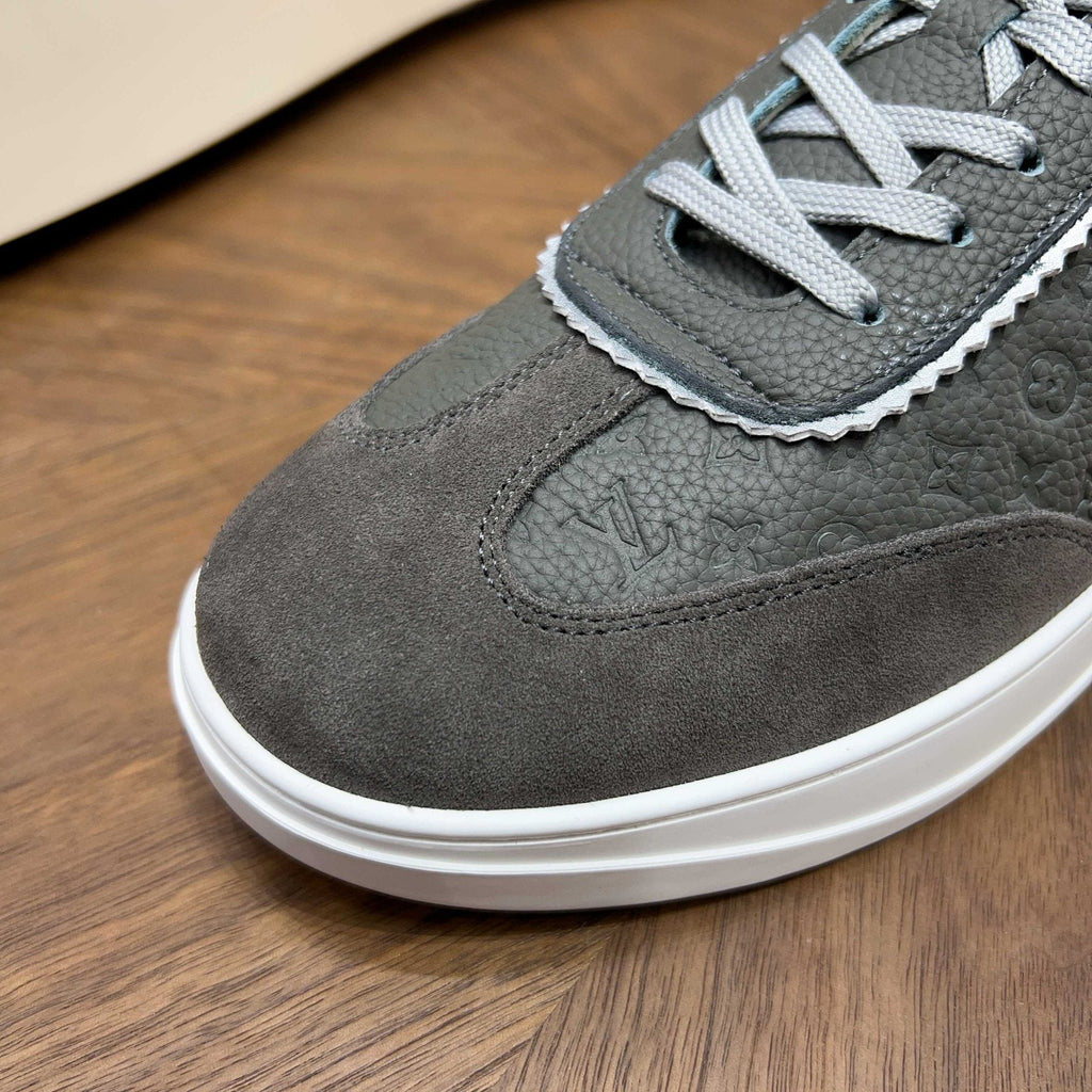 Louis Vuitton Embossed Low-Top Sneakers — detail
