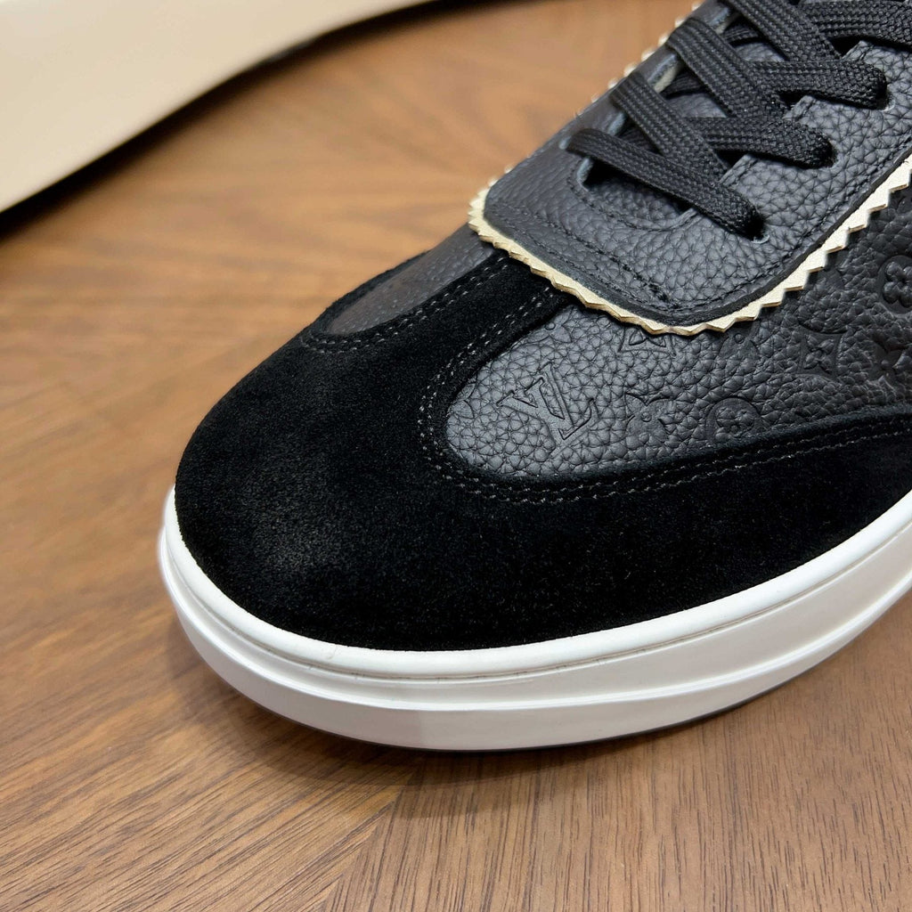 Louis Vuitton Embossed Low-Top Sneakers — detail