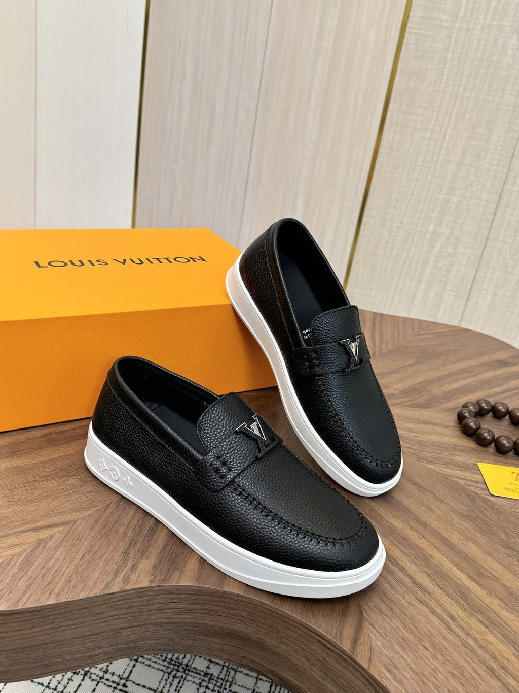 Louis Vuitton Logo Strap Slip-On Shoes — side