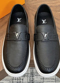 Louis Vuitton Logo Strap Slip-On Shoes — hero