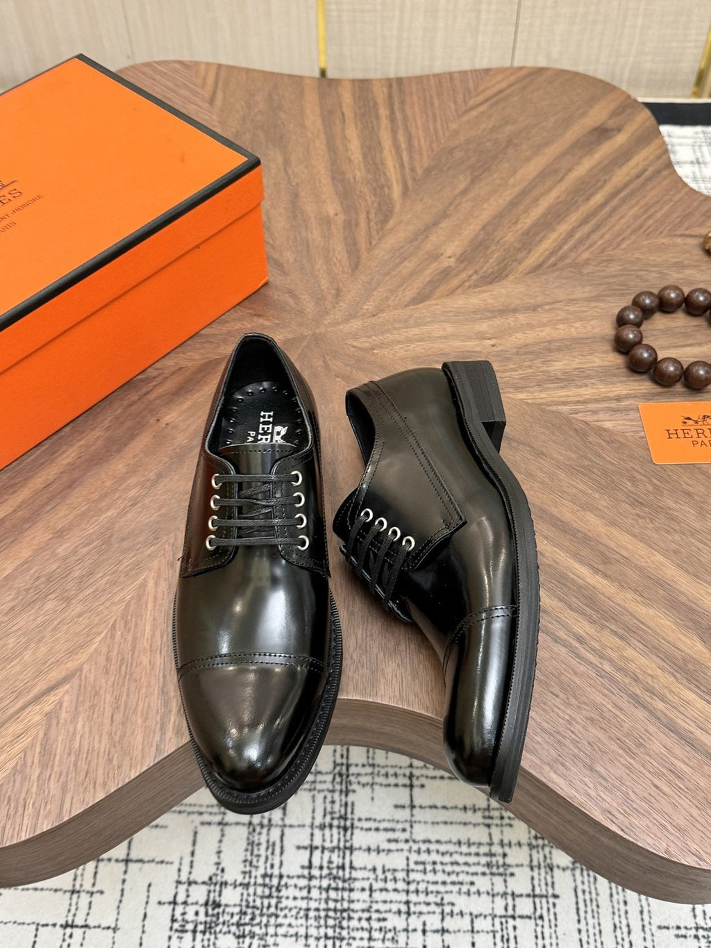 Hermès Polished Leather Lace-Up Dress Shoes — front