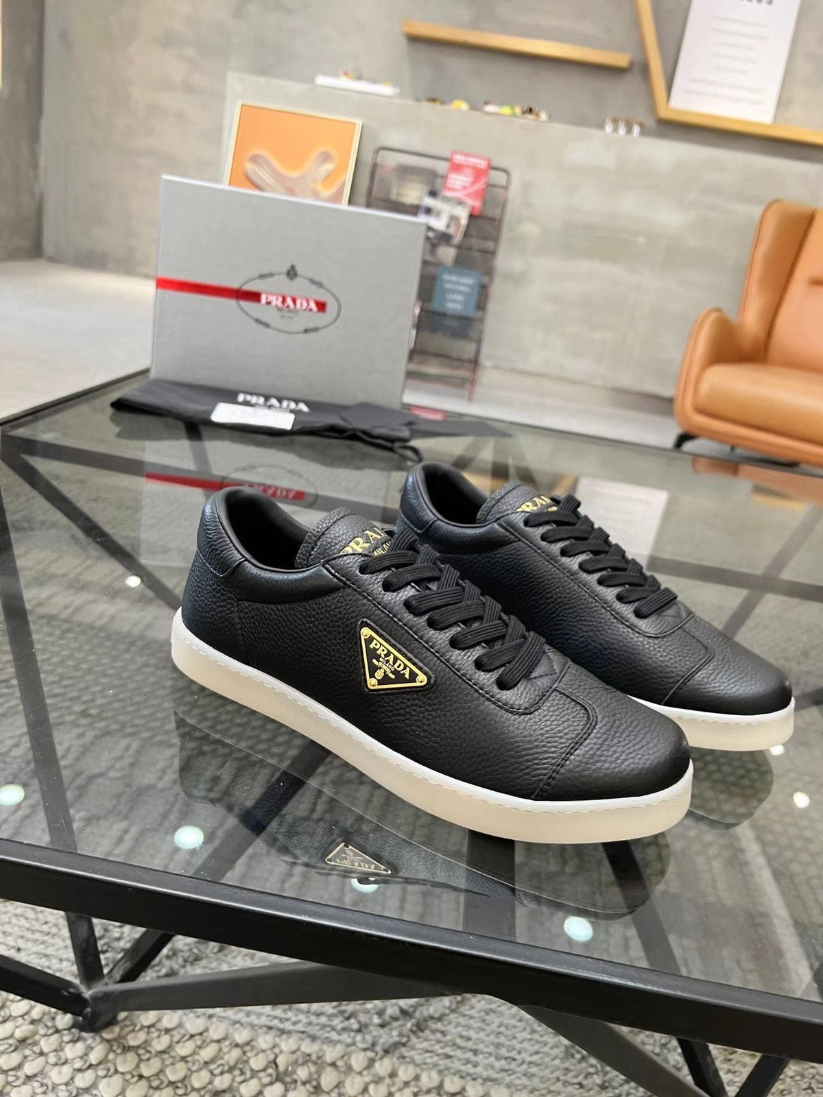 Prada Gold Accent Low-Top Sneakers — front