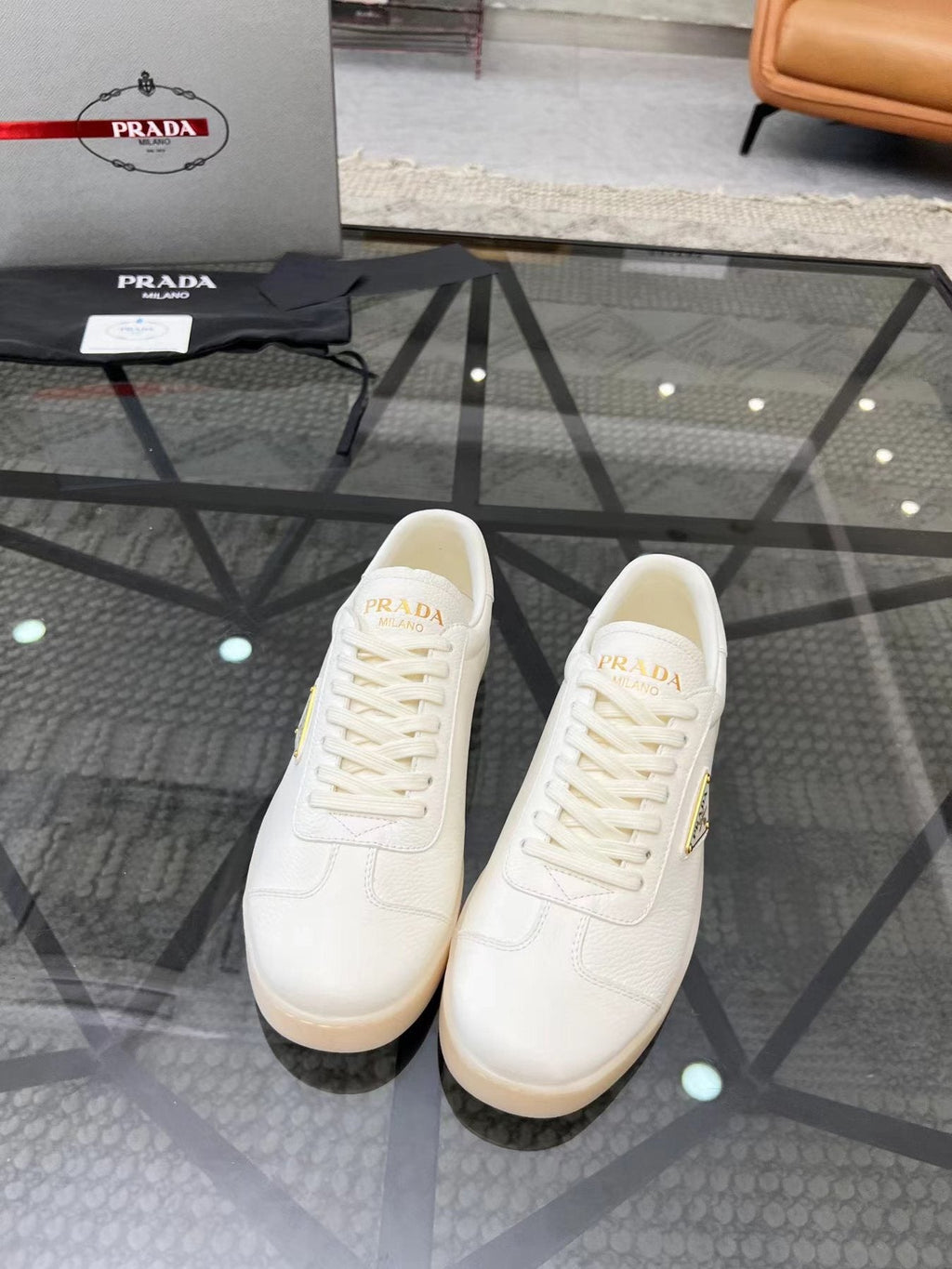 Prada Gold Accent Low-Top Sneakers — front