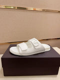 Valentino V Logo Slide Sandals — hero