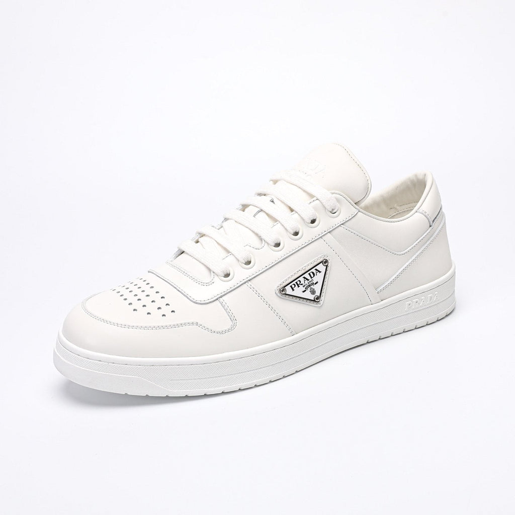 Prada Triangle Plaque Low-Top Sneakers — hero