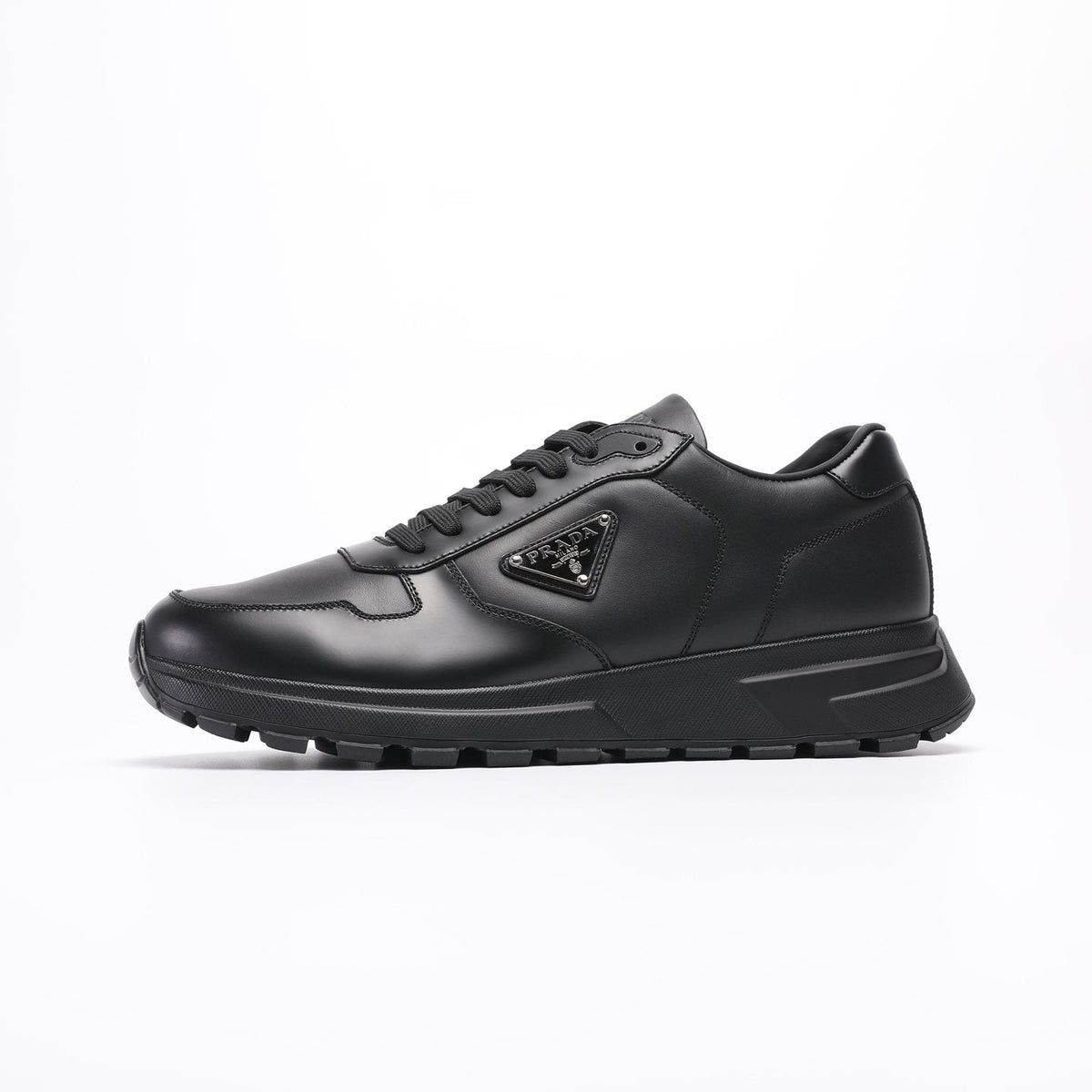 Prada Triangle Plaque Low-Top Sneakers — front