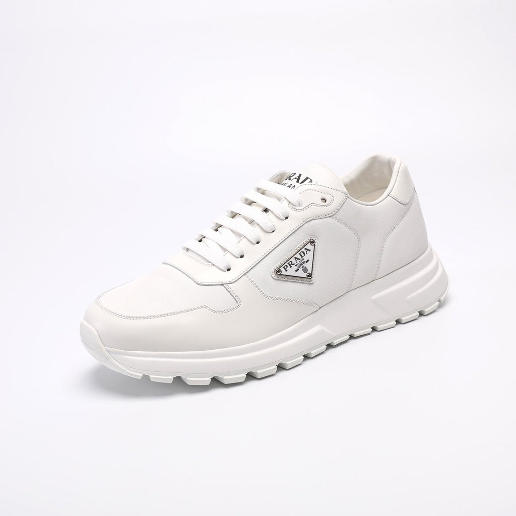 Prada Triangle Plaque Low-Top Sneakers — front