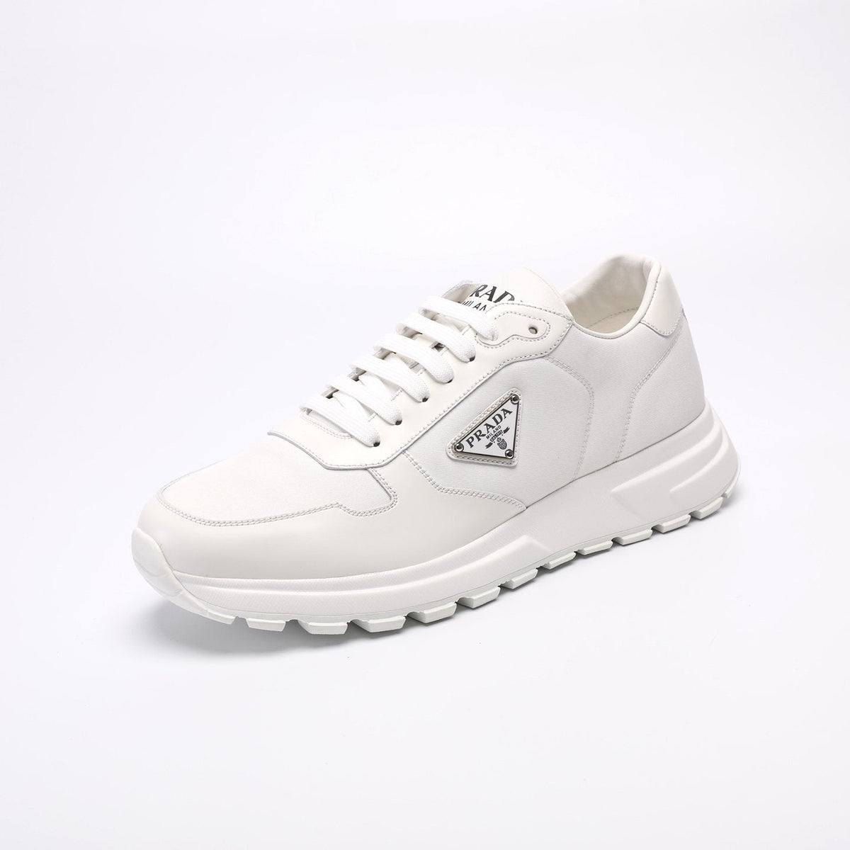 Prada Triangle Plaque Low-Top Sneakers — front