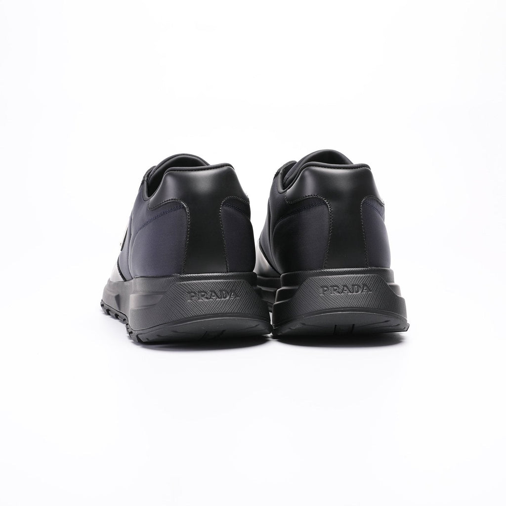 Prada Triangle Plaque Low-Top Sneakers — back