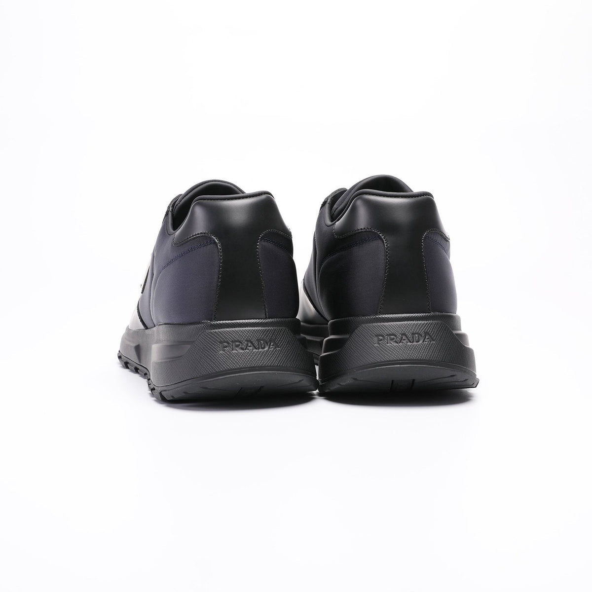 Prada Triangle Plaque Low-Top Sneakers — back