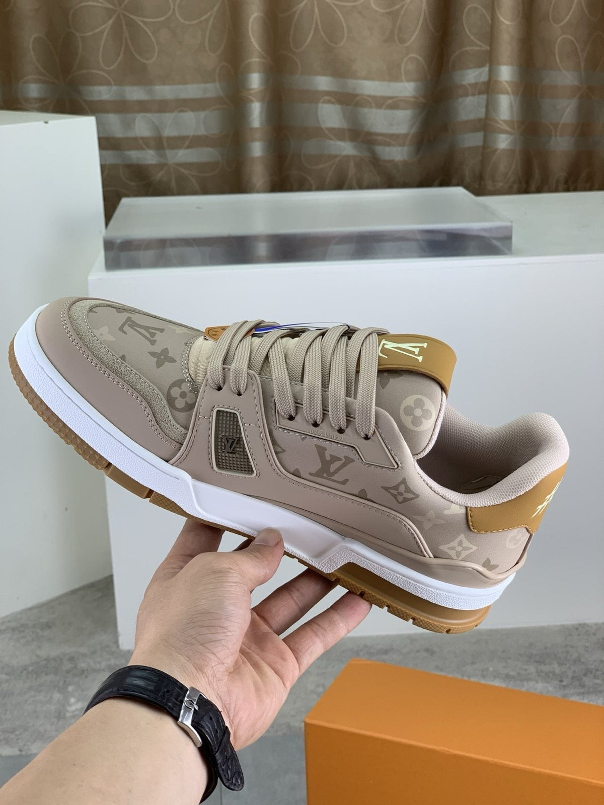 Louis Vuitton Beige, White & Gold Low-Top Sneakers — model