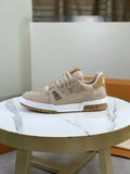 Louis Vuitton Beige, White & Gold Low-Top Sneakers — front