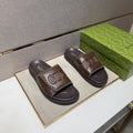 Gucci Raised Logo Slide Sandals — front