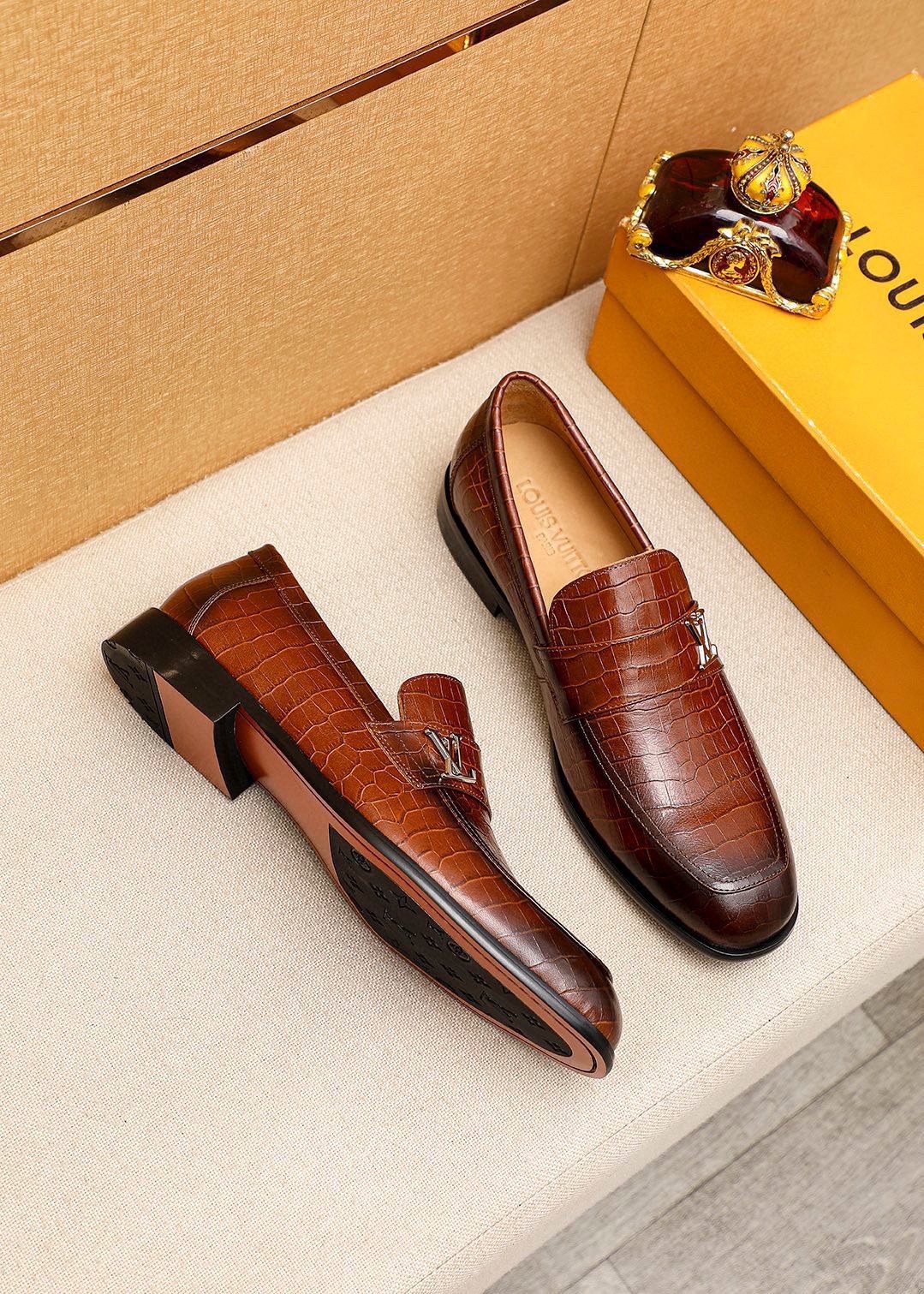 Louis Vuitton Embossed Metal-Accent Loafers — front