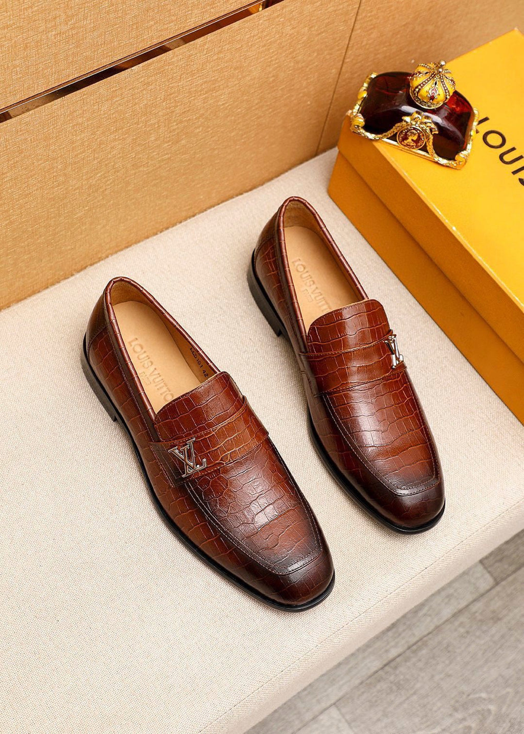 Louis Vuitton Embossed Metal-Accent Loafers — hero