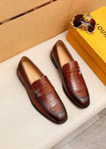 Louis Vuitton Embossed Metal-Accent Loafers — hero