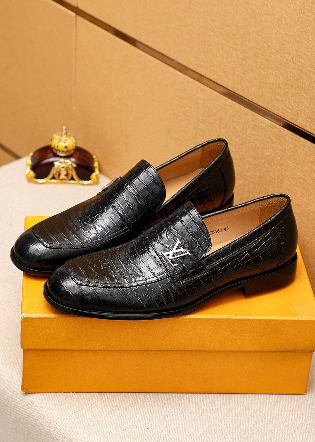 Louis Vuitton Embossed Metal-Accent Loafers — front