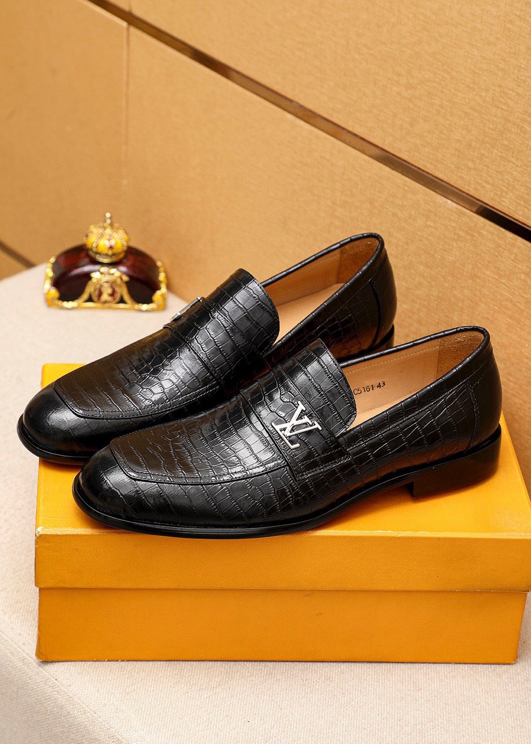 Louis Vuitton Embossed Metal-Accent Loafers — front