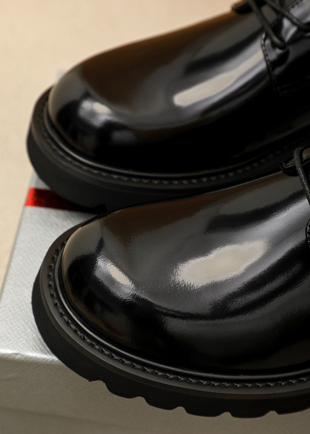 PRADA Glossy Lug Sole Derby Shoes — detail