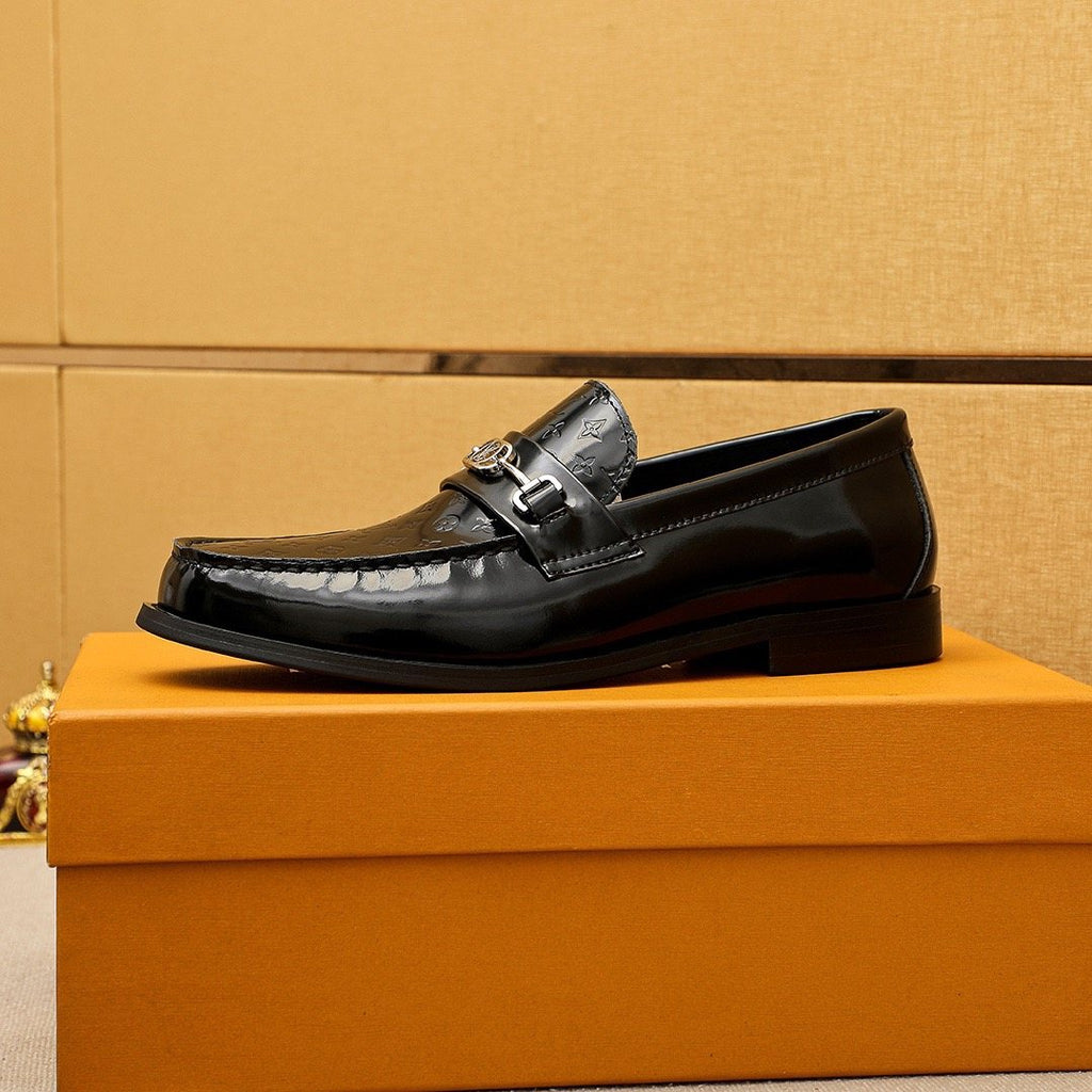 Louis Vuitton Embossed Buckle Loafers — side