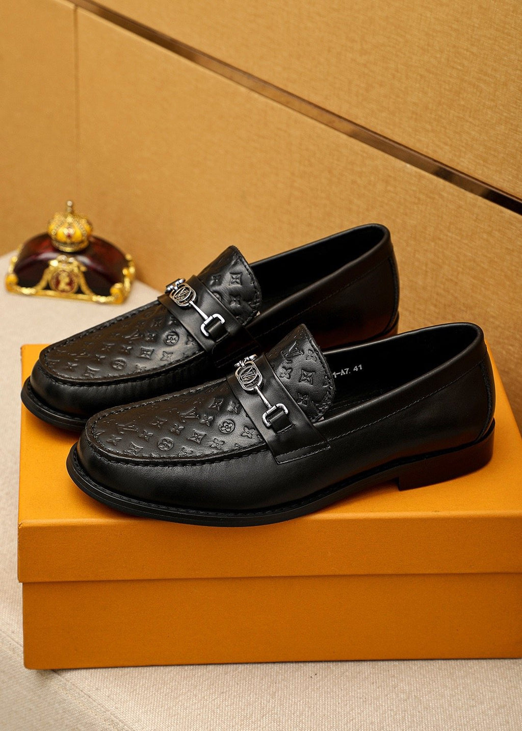 Louis Vuitton Embossed Buckle Loafers — front
