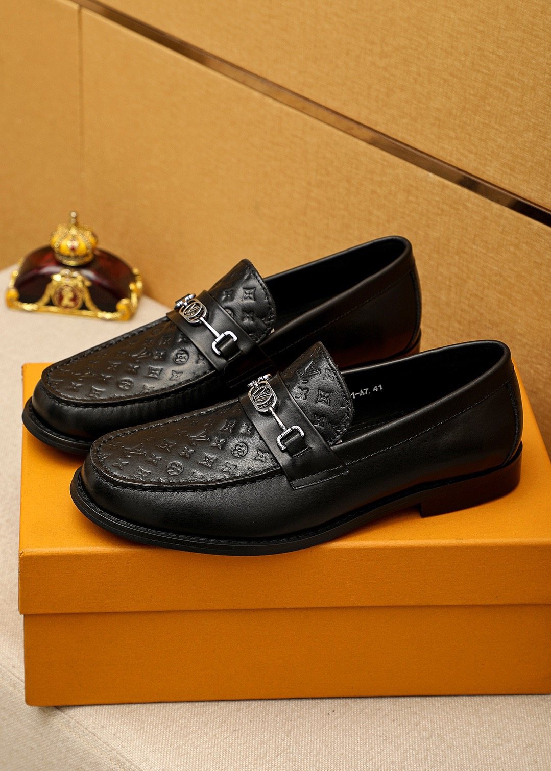 Louis Vuitton Embossed Buckle Loafers — front