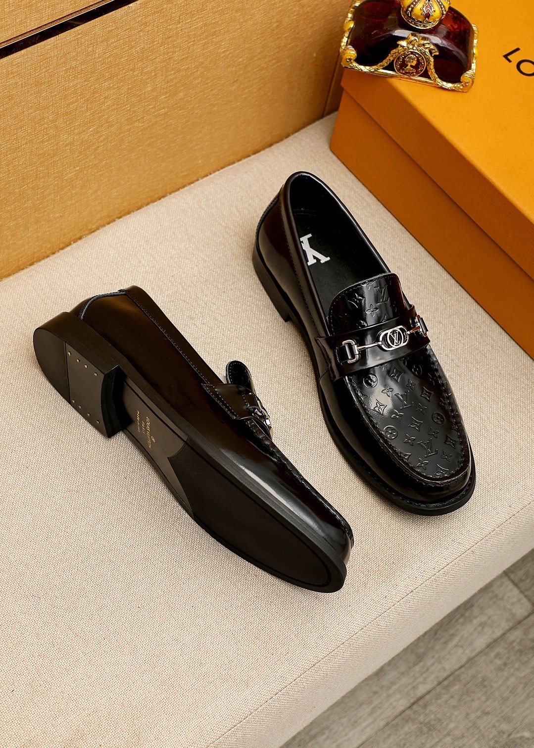 Louis Vuitton Embossed Buckle Loafers — side