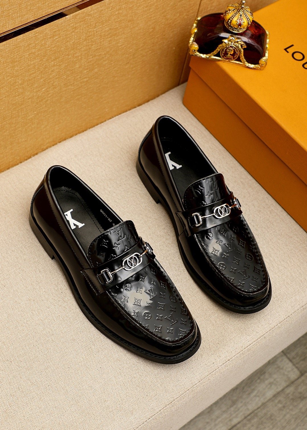 Louis Vuitton Embossed Buckle Loafers — front