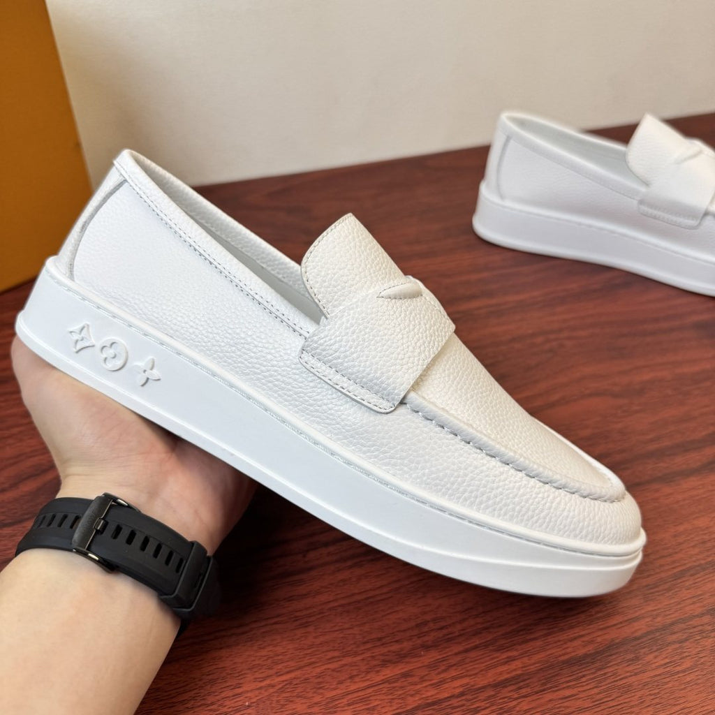 Louis Vuitton Textured Slip-On Loafers — model