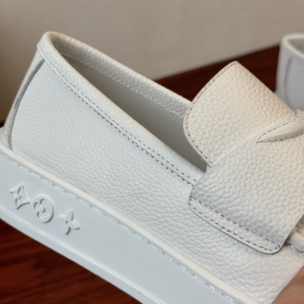 Louis Vuitton Textured Slip-On Loafers — detail
