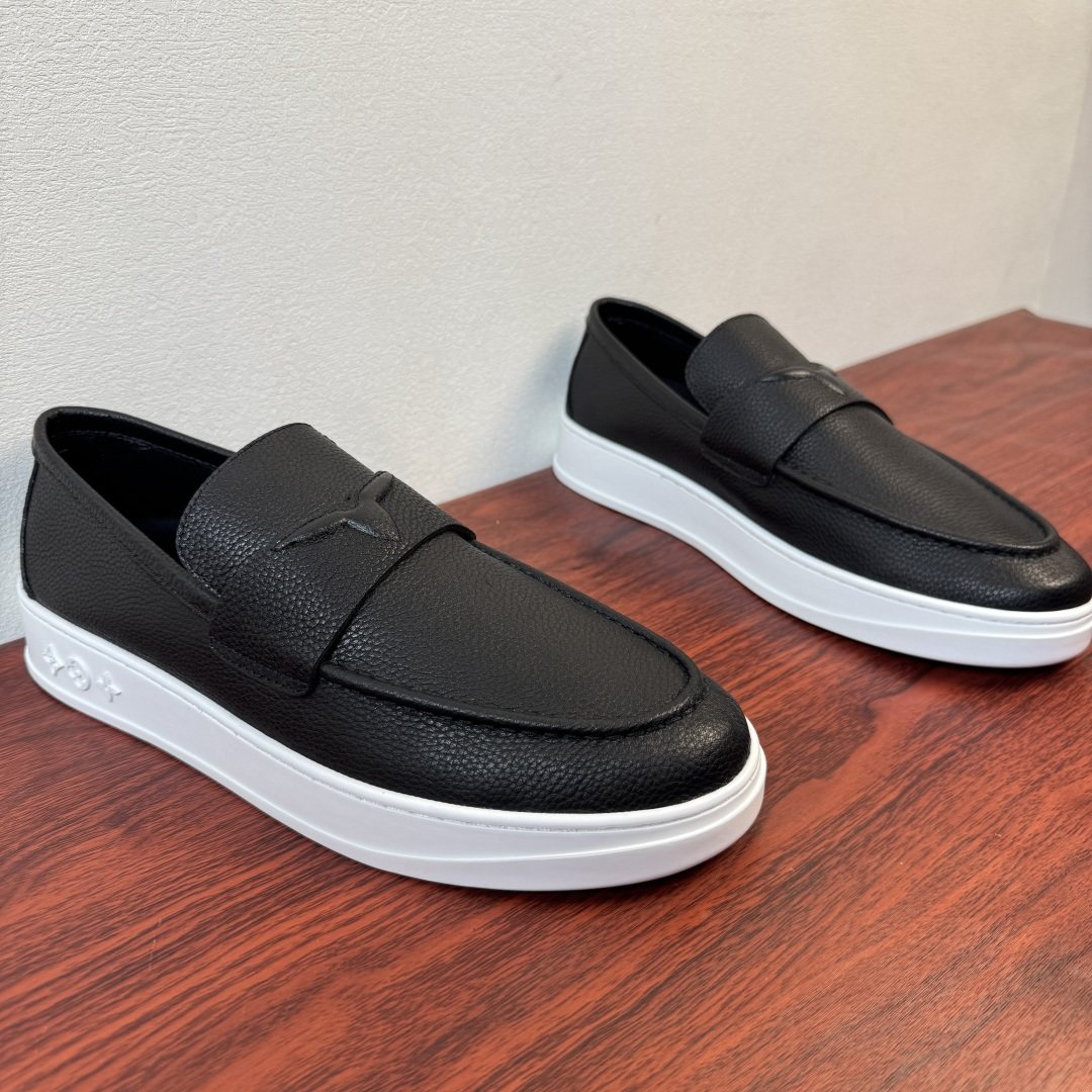 Louis Vuitton Textured Slip-On Loafers — front