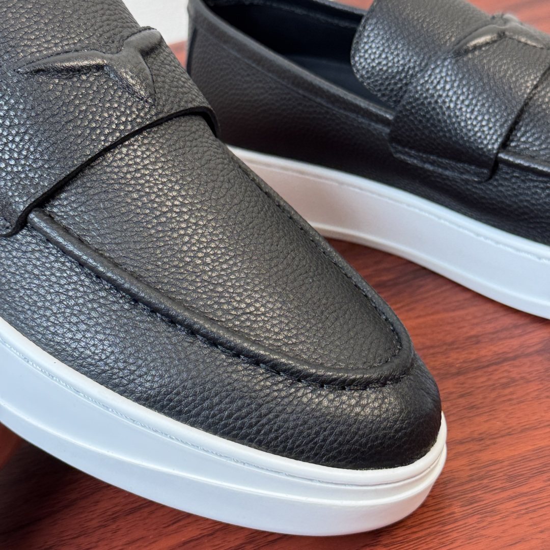 Louis Vuitton Textured Slip-On Loafers — detail