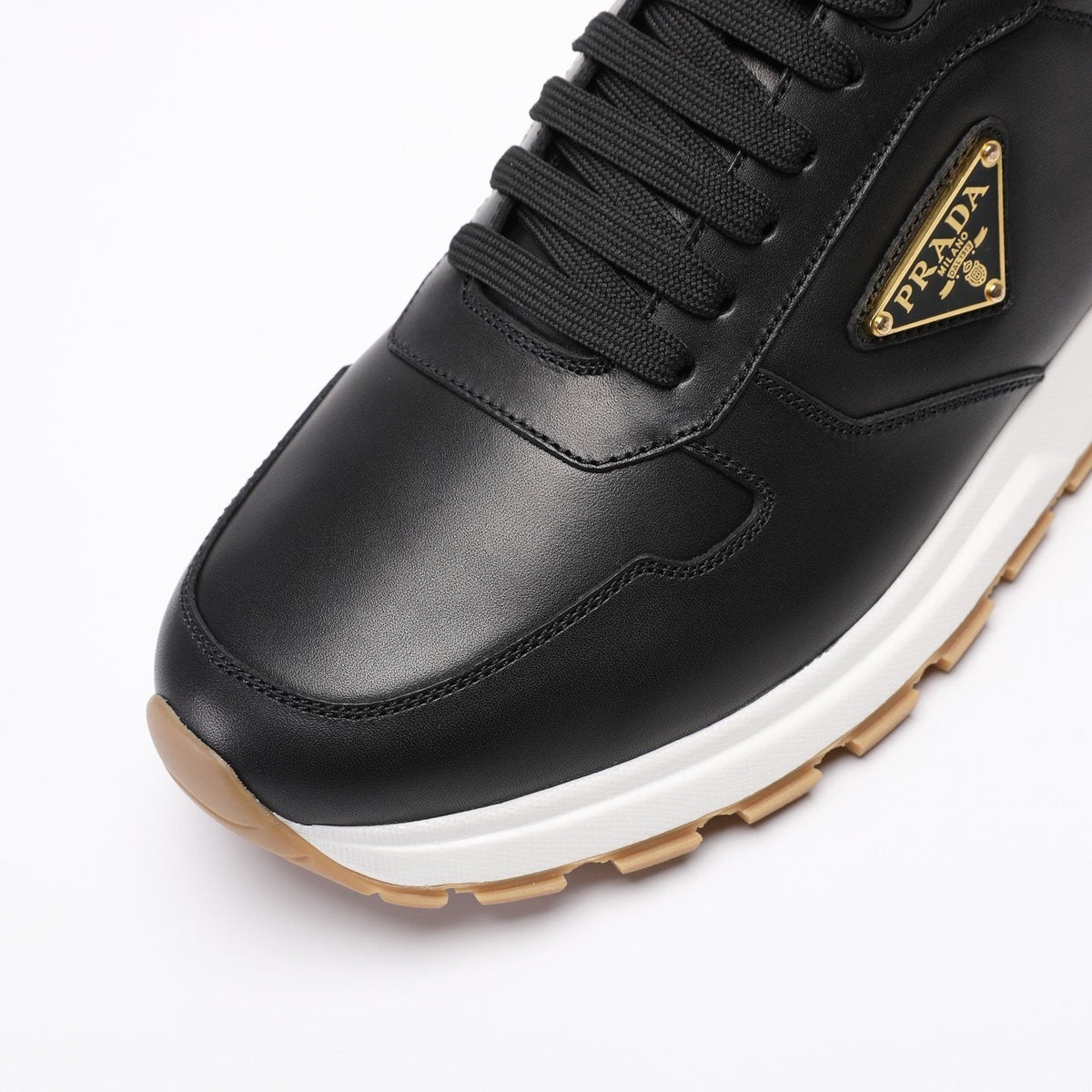 Prada Triangle Badge Low-Top Sneakers — front