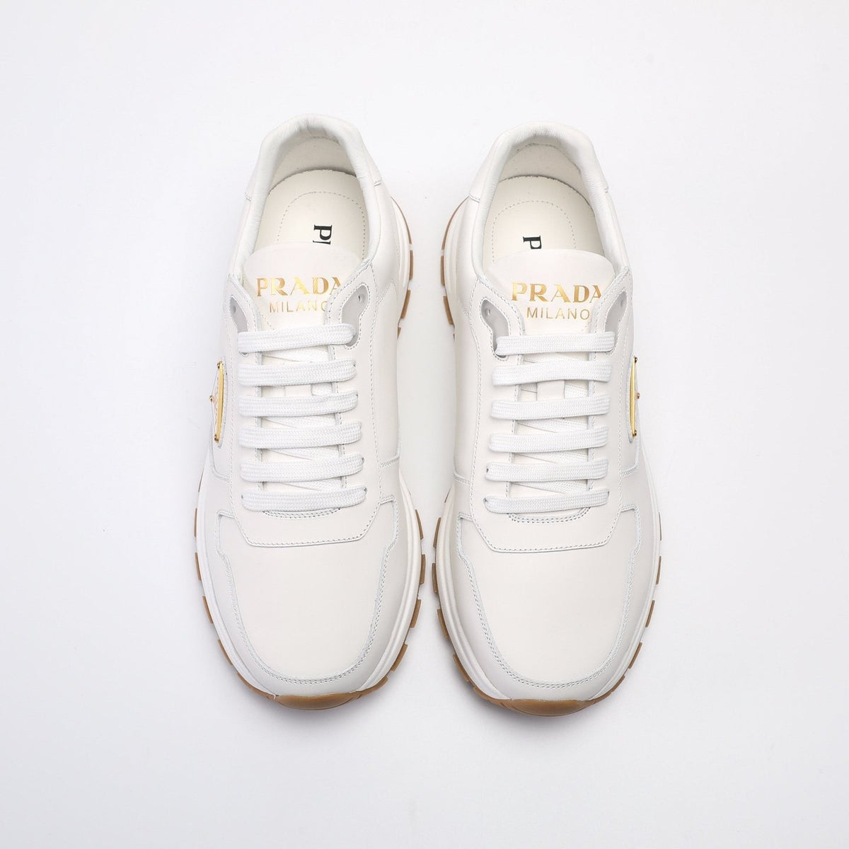 Prada Triangle Badge Low-Top Sneakers — front