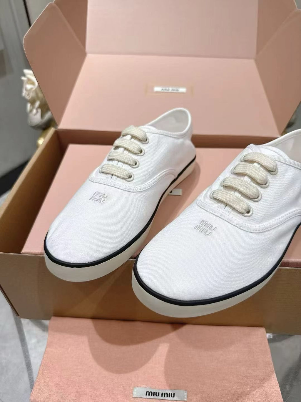 Miu Miu Low-Top Canvas Sneakers — hero