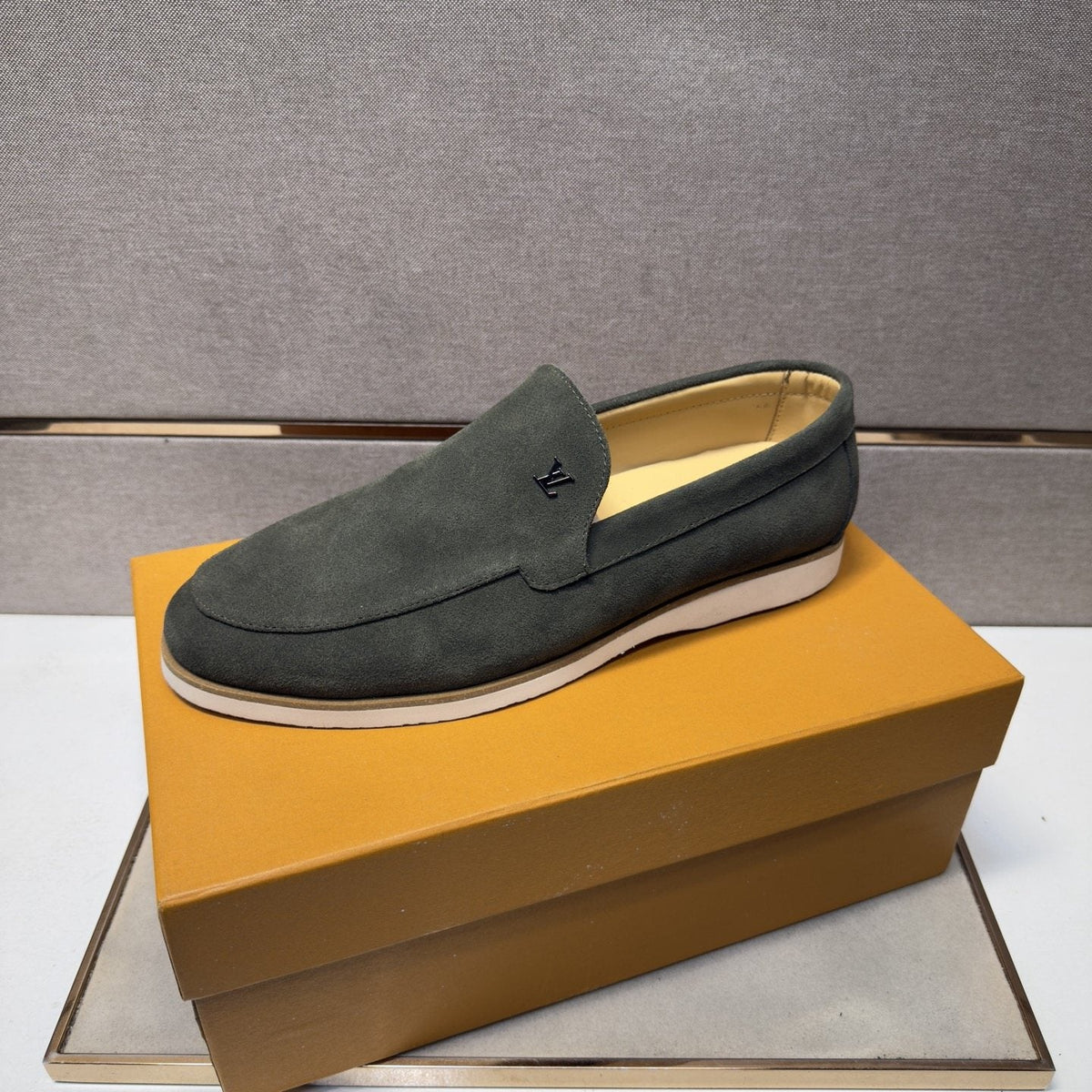 Louis Vuitton Men’s Textured Slip-On Loafers — side