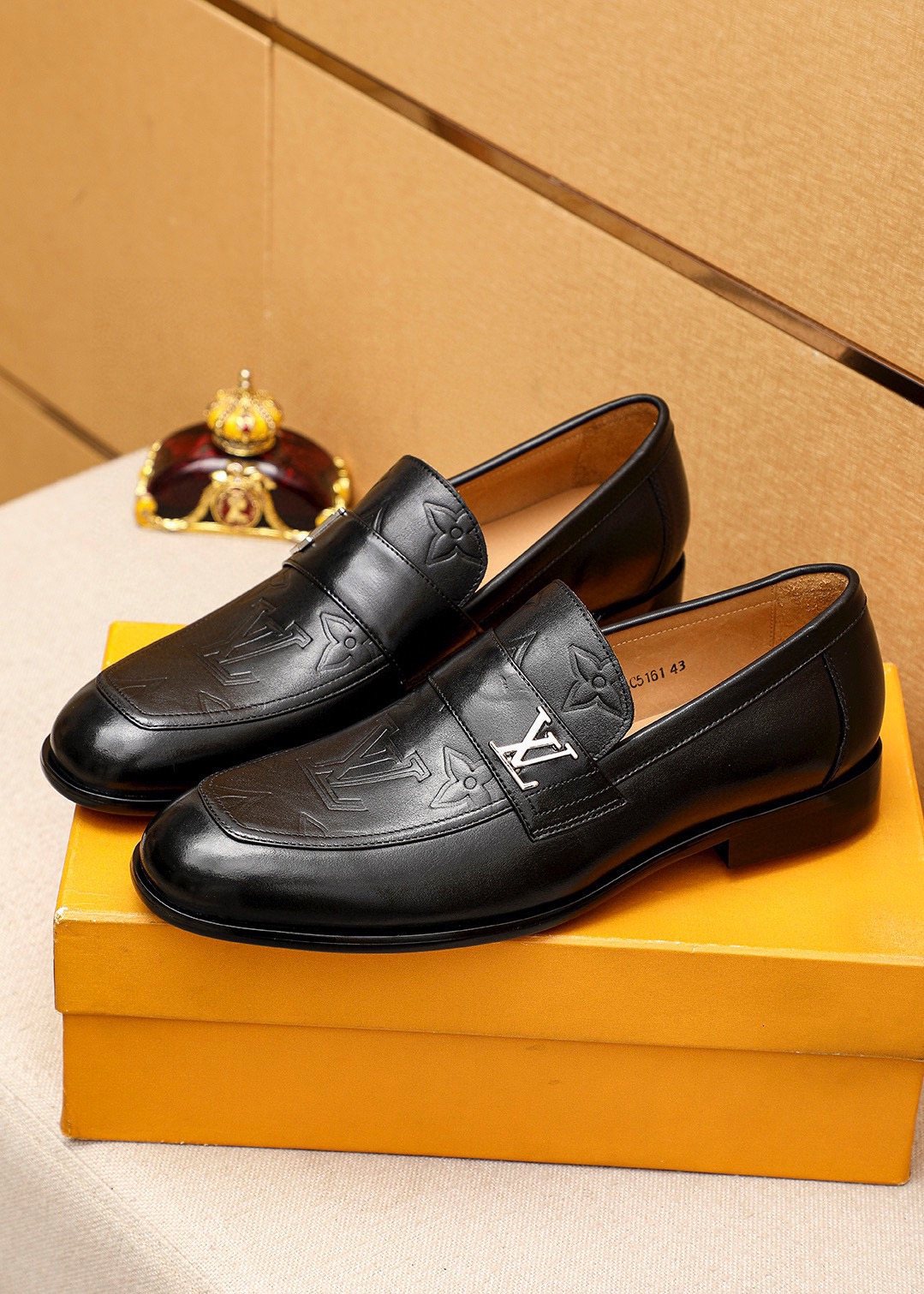 Louis Vuitton Embossed Leather Loafers — front