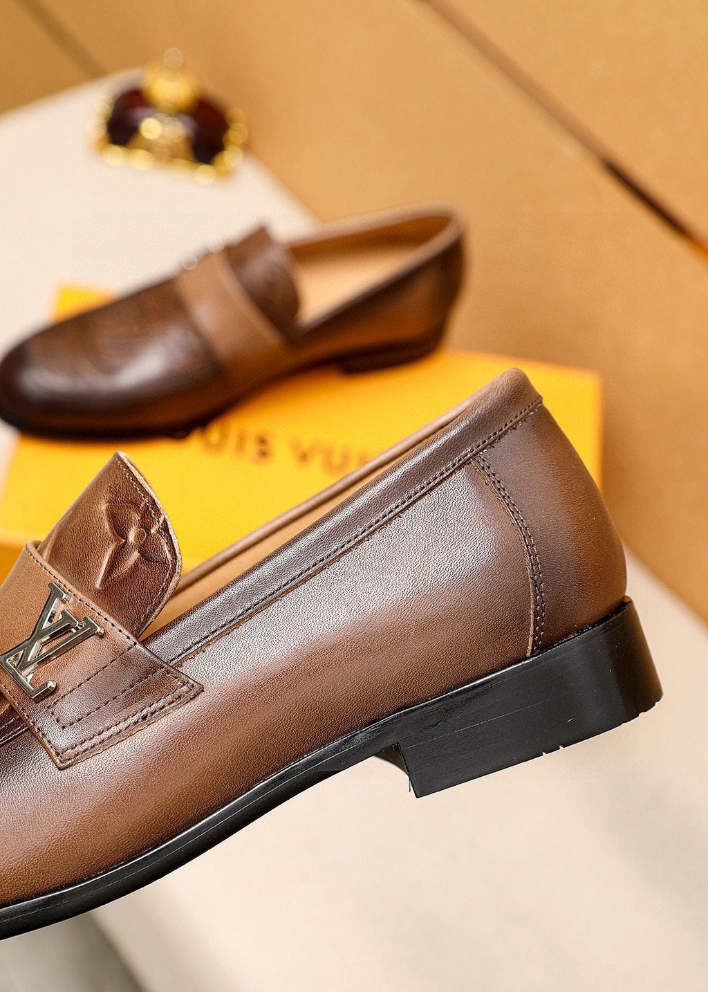 Louis Vuitton Embossed Leather Loafers — front
