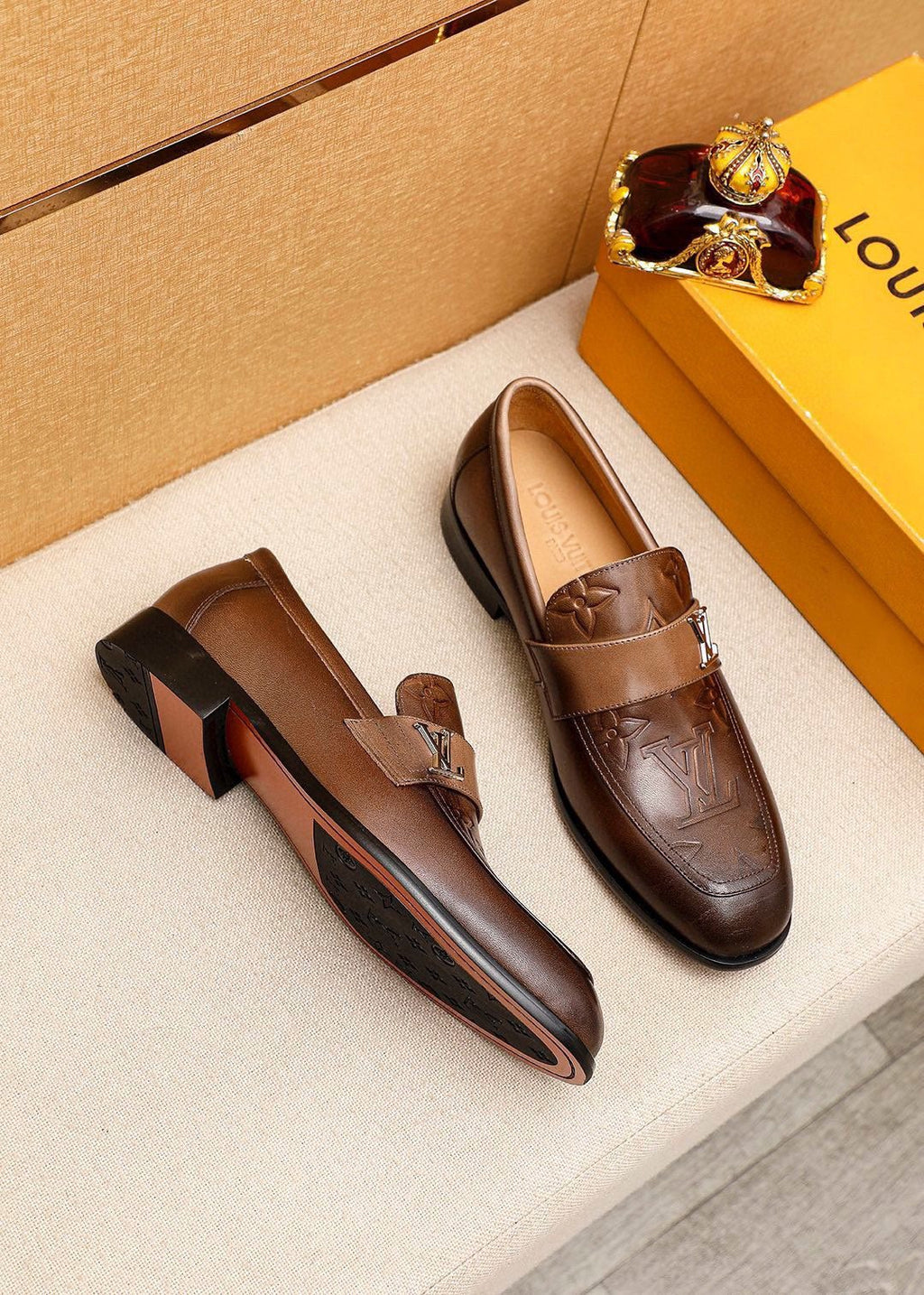 Louis Vuitton Embossed Leather Loafers — front