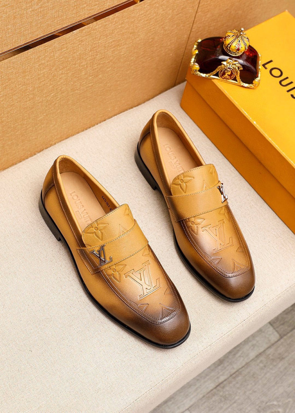 Louis Vuitton Embossed Leather Loafers — front