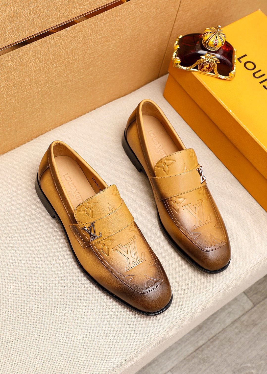 Louis Vuitton Embossed Leather Loafers — front