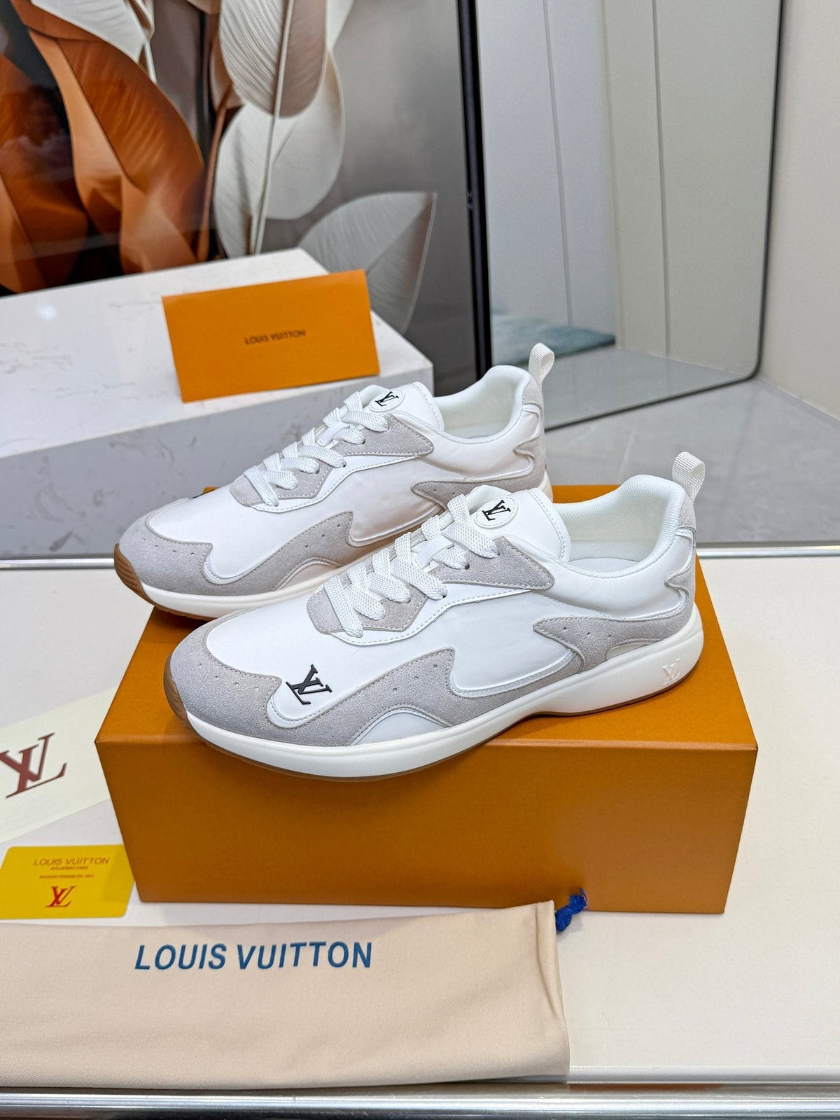 Louis Vuitton Cream Patterned Low-Top Sneakers — side