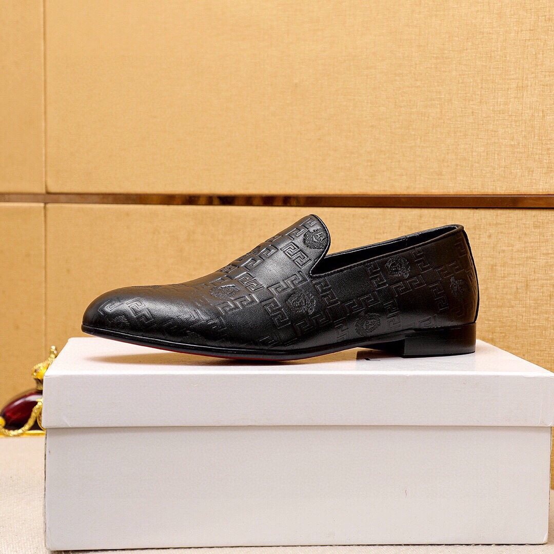 Versace Embossed Leather Slip-On Shoes — side