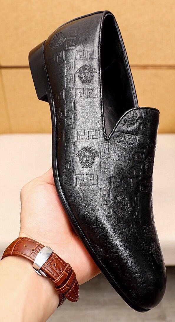 Versace Embossed Leather Slip-On Shoes — front